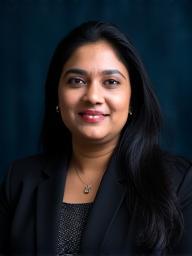 Professional headshot of Priya Kapoor, Head of Threat Analysis
